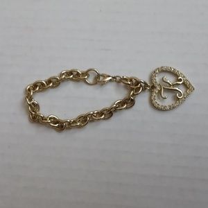 4/$30 Gold Coloured Bracelet With "K" Heart Charm